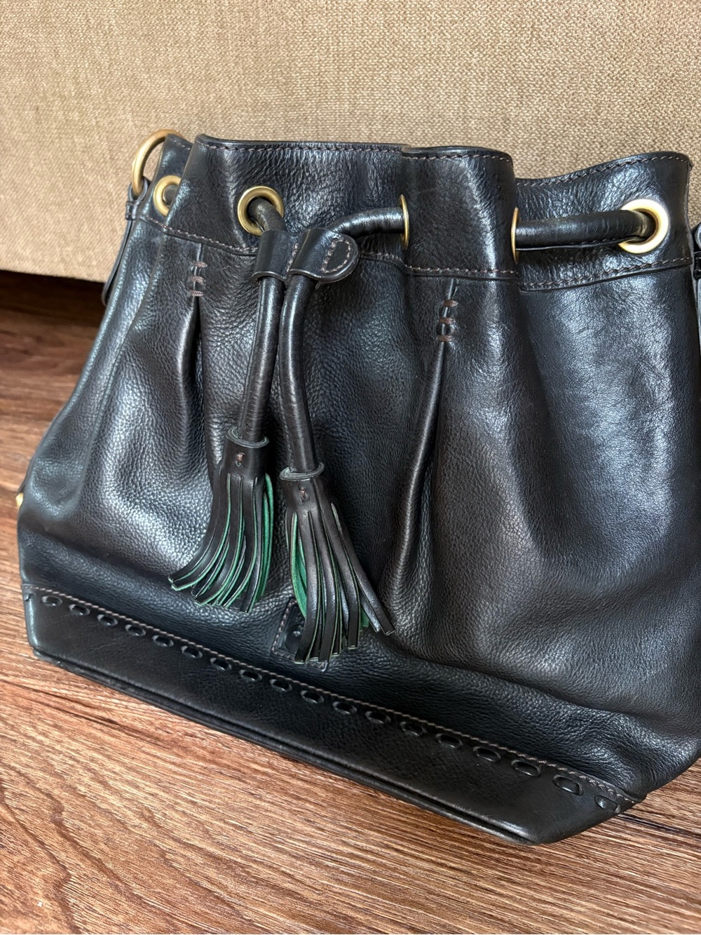Dooney & Bourke Black Leather Drawstring Bucket Bag with Tassels
